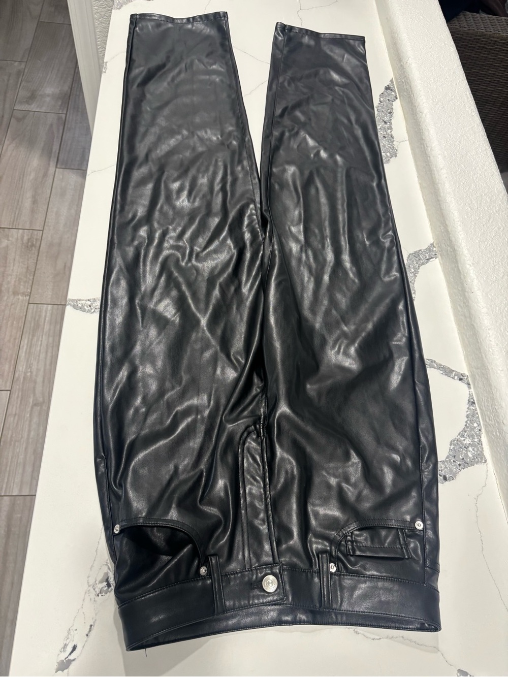 Divided leather pants size 4 in good condition
